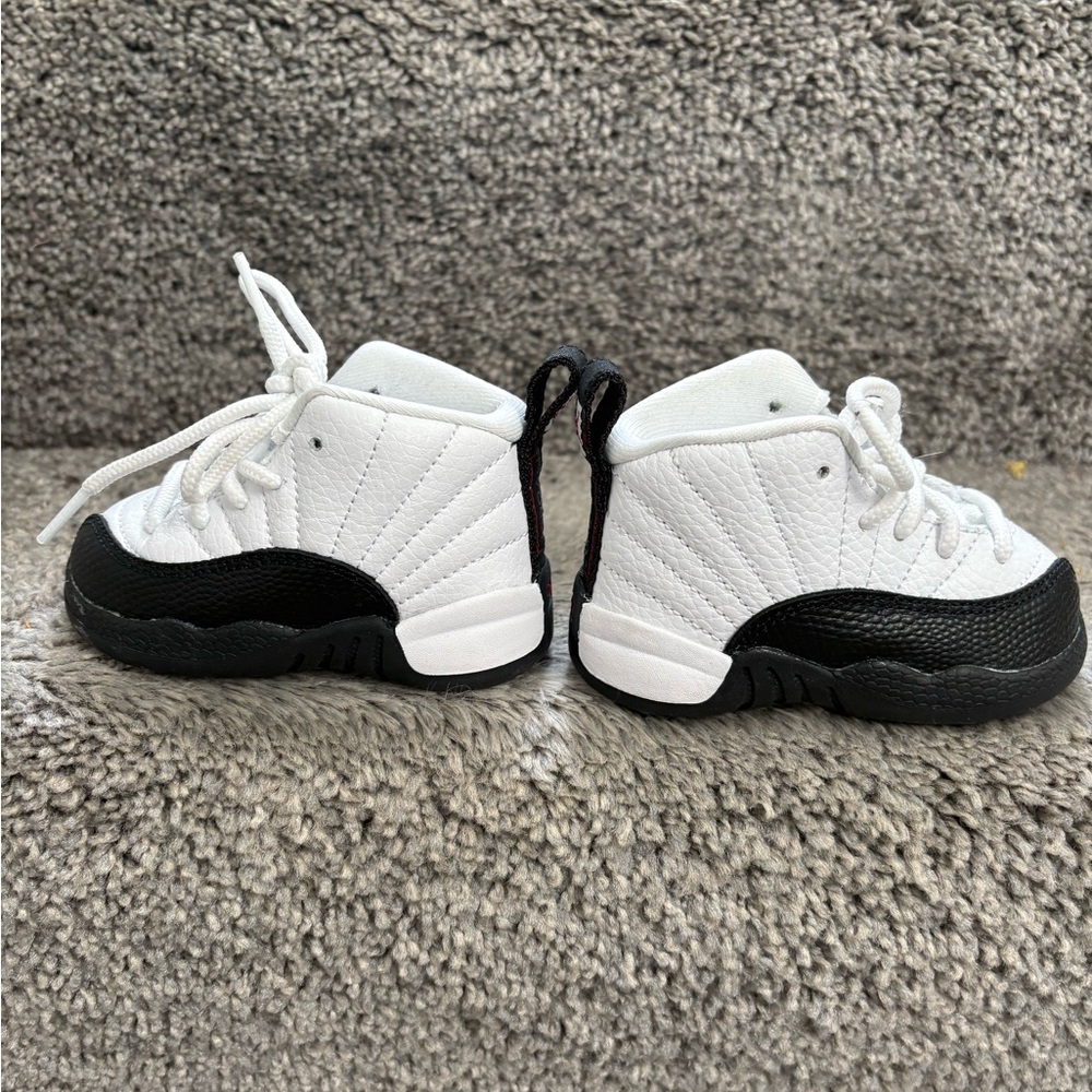 Black and white Jordan 12s